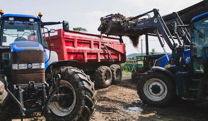 Increase tyre pressure to work with a front loader on hard ground