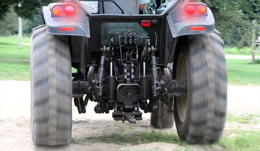 The rate at which you slow down is linked to speed, tractor mass and tyre adherence to the ground